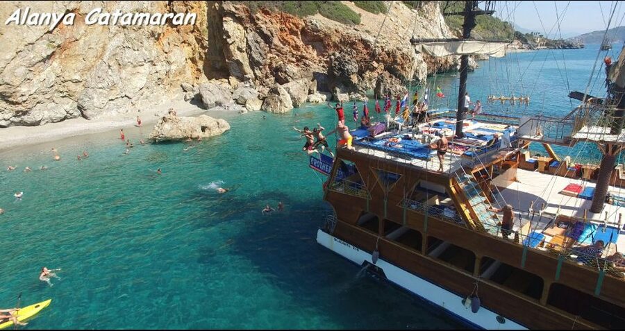 Alanya: Catamaran Boat Trip with Sunbathing and Swimming - Setting off from Alanya Harbour near the Red Tower