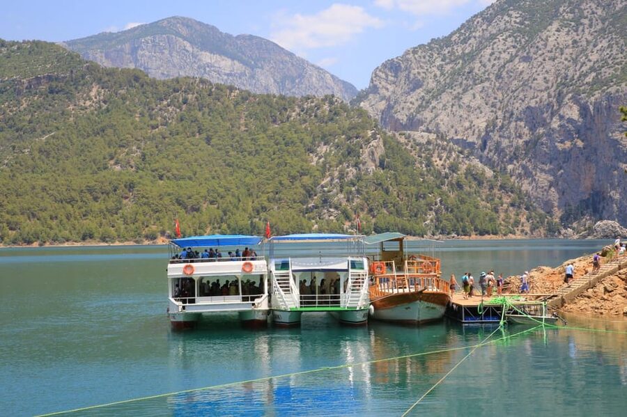 Alanya: Green Canyon Boat Trip with Lunch and Hotel Pickup - Boarding the boat at Green Canyon