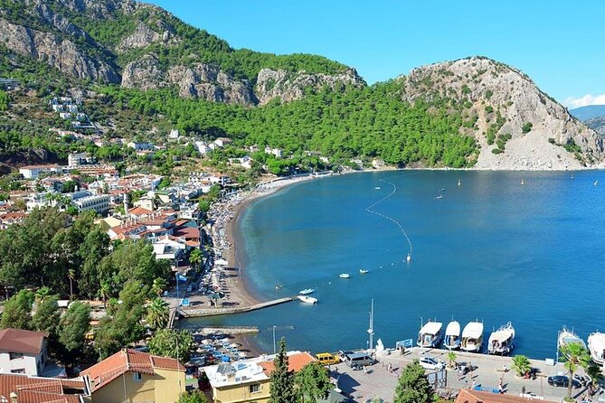 All Inclusive Marmaris Boat Trip With Lunch & Unlimited Drinks - Amos Beach combines swimming and lunch