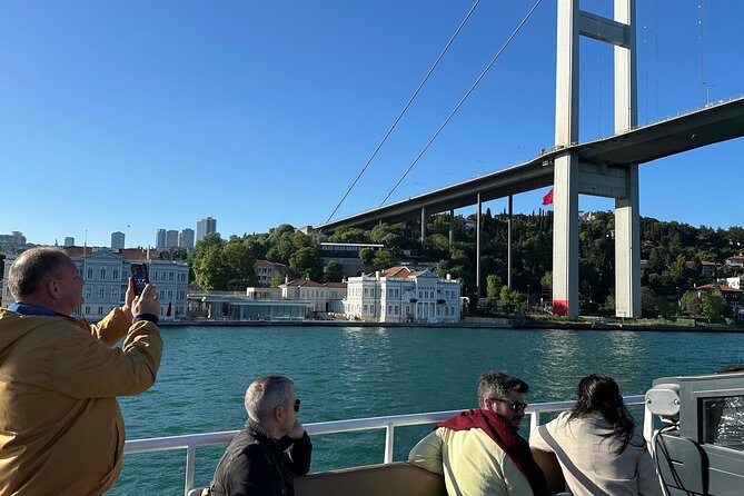 Bosphorus Daytime or Sunset Sightseeing Cruise & Audio Guide - Çırağan Palace and Ortaköy Mosque: two very different waterfront icons