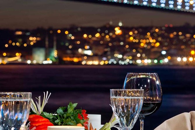 Bosphorus Night Cruise with Dinner, Show and Hotel Transfer - Dinner while the city moves past