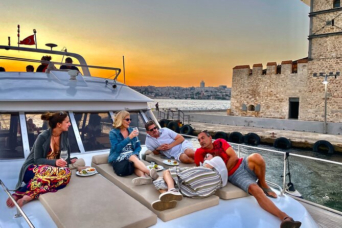 Bosphorus Sunset or Daytime Yacht Cruise with Snacks & Live Guide - Dolmabahçe Palace and the European Shore