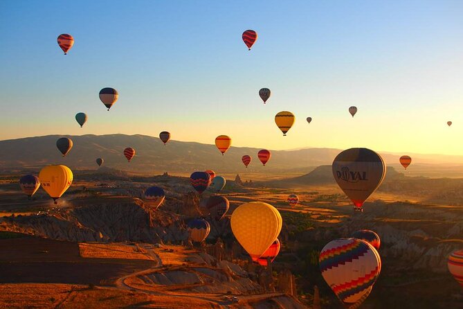 Cappadocia Hot Air Balloon Flight Over Fairy Chimneys And Goreme - Sunrise above the fairy chimneys