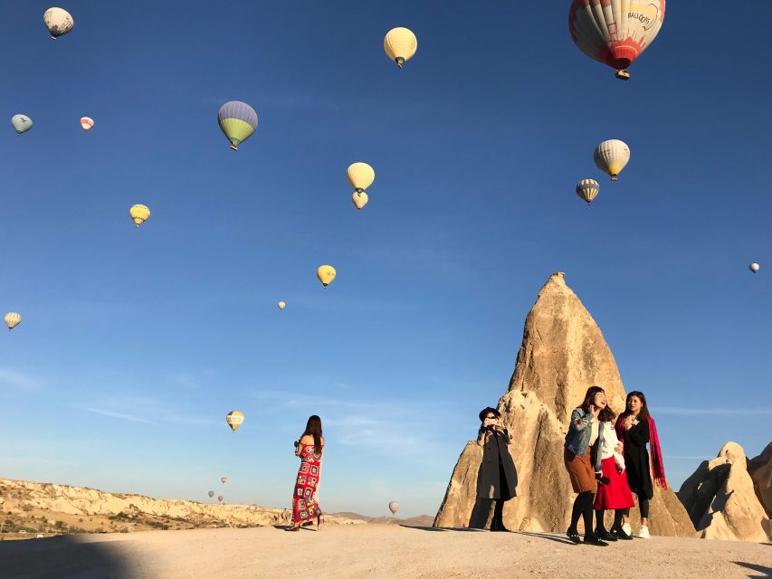 Cappadocia: Sunrise Hot Air Balloon Watching Experience - Before sunrise at the balloon launch area