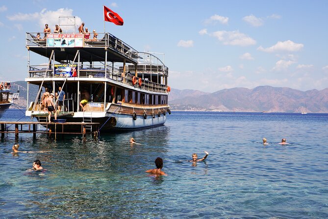 Dolphin Island Boat Trip – Swim, Sun & Lunch Included - Music, animation, and the foam party