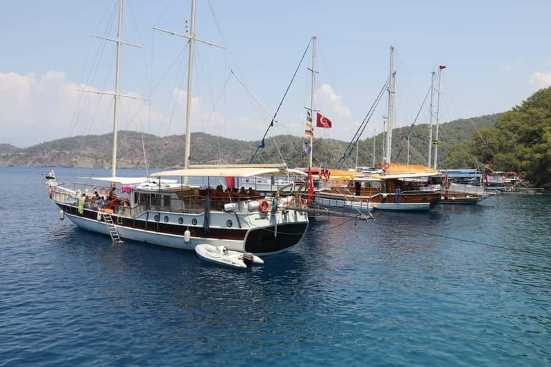 Fethiye: Island Sailing Trip with Lunch and Hotel Pickup - Red Island Over a Red Seabed