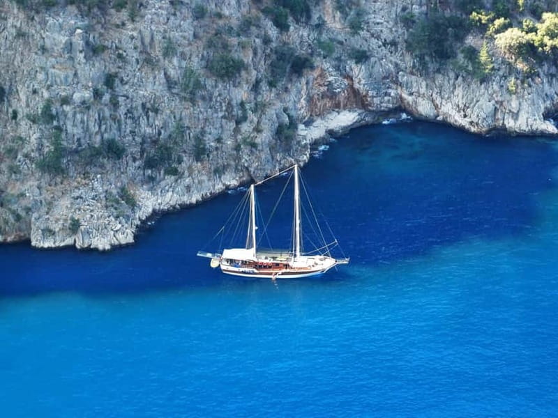 Fethiye: Island Sailing Trip with Lunch and Hotel Pickup - Flat Island and Its Dark Blue Water