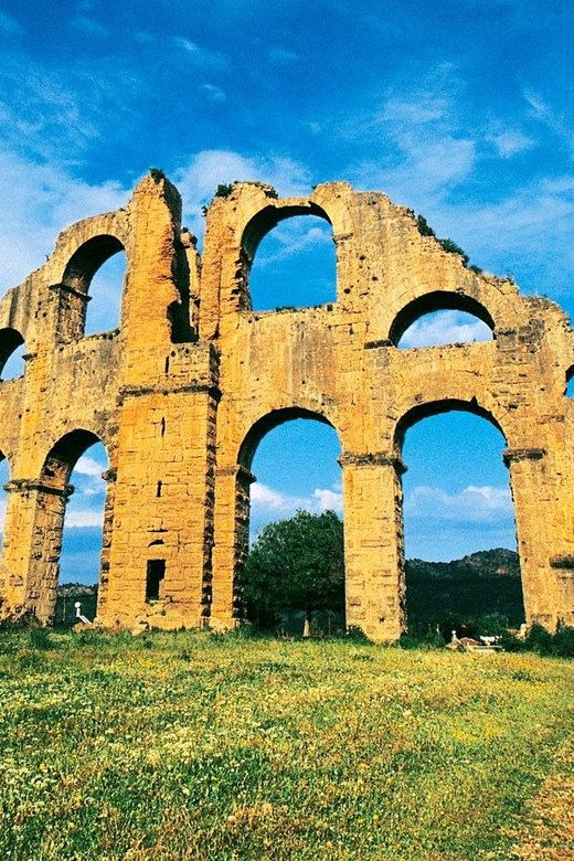 From Antalya: Day Tour of Ancient Roman Sites - Side: Roman ruins beside the Mediterranean