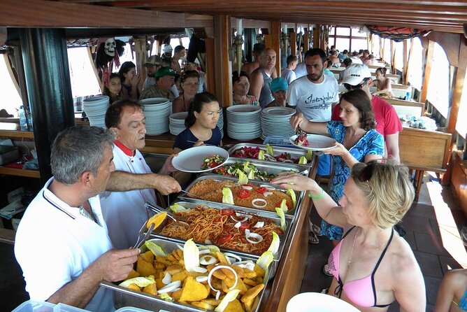 GONSTER : Luxury Pirate Boat Trip Lunch & Soft Drinks & Transfer - Cennet Bay pairs a quiet cove with lunch