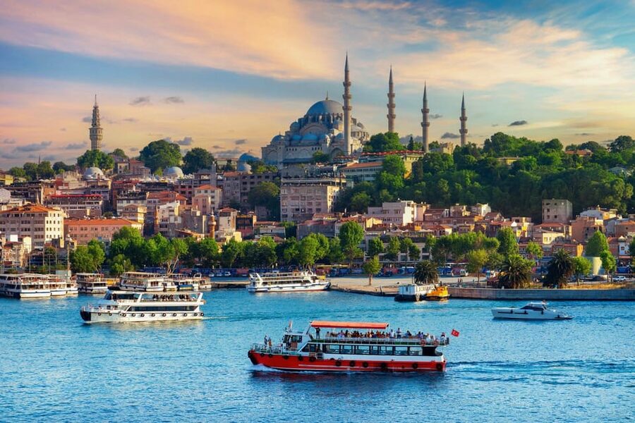 Istanbul: Bosphorus Strait Sightseeing Cruise & Audio Guide - Leaving Kabataş with Dolmabahçe Palace in view