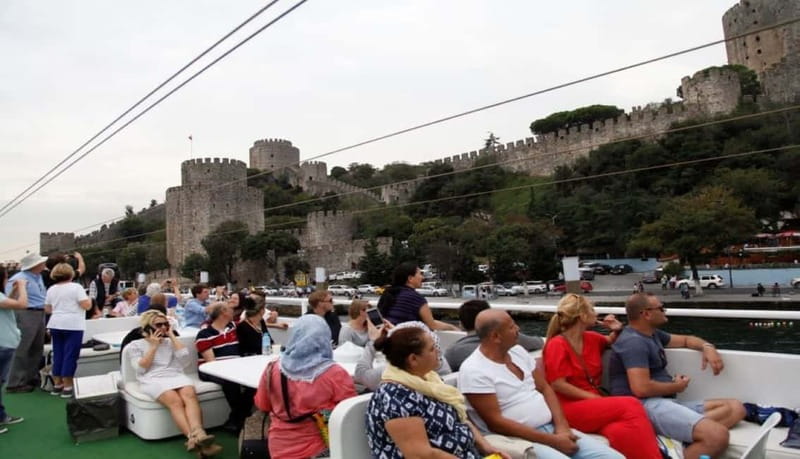 Istanbul: Guided Bosphorus Cruise & Golden Horn Bus Tour - Turkish tea, baklava, and the shopping stop