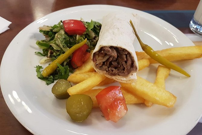Istanbul Kadikoy Food Tour with 12+ Local Delicacies Tastings - Coffee, wine, and local stories on Damacı Sokak
