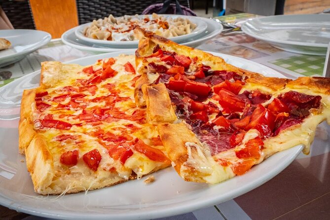 Istanbul Kadikoy Food Tour with 12+ Local Delicacies Tastings - Lahmacun and the Kadikoy market on Güneşlibahçe Sokağı