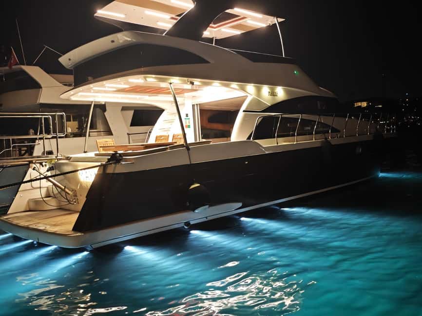 Istanbul: Private Bosphorus Yacht with Tour Guide and Snacks - Settling in with indoor and outdoor seating