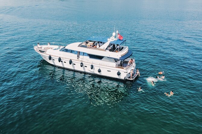 Istanbul Sunset Yacht Cruise on the Bosphorus with Transfers - Çırağan Palace and the Ottoman waterfront