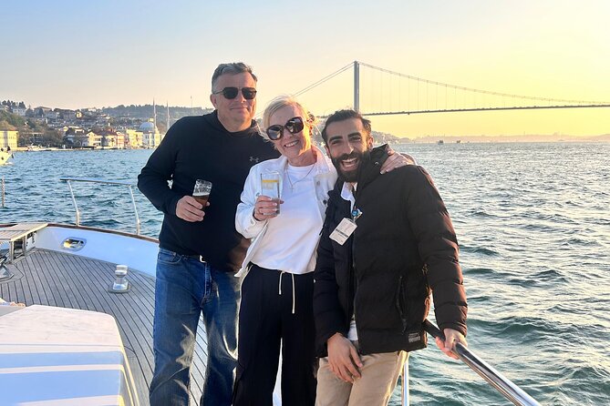 Istanbul Sunset Yacht Cruise on the Bosphorus with Transfers - Ortaköy Mosque beneath the First Bosphorus Bridge