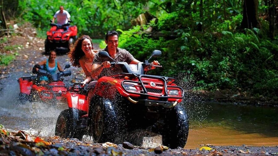 Kemer: Quad Safari Experience - Riding over rocks, mud, and shallow water