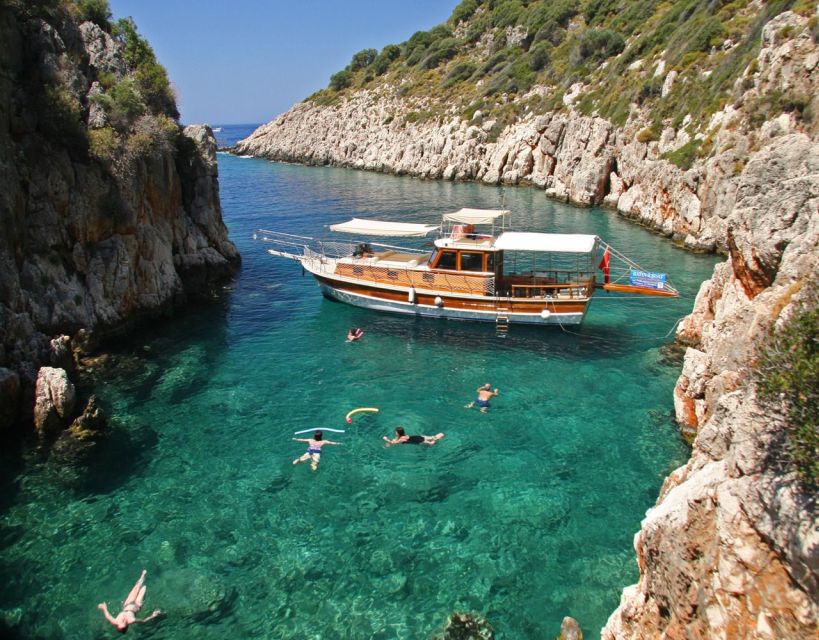 Kusadasi: Full-Day Boat Cruise w/ Lunch & Hotel Pickup - The boat setup: sunbeds, shade, and a social mood