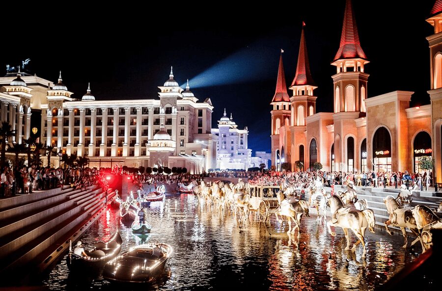Side: Land of Legends Bus Transfers and Boat Parade - Rides, water activities, shopping, and food