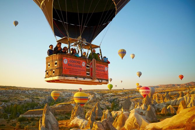 Sunrise Hot Air Balloon Flight Over Göreme & Fairy Chimneys - Watching the balloons inflate near Göreme